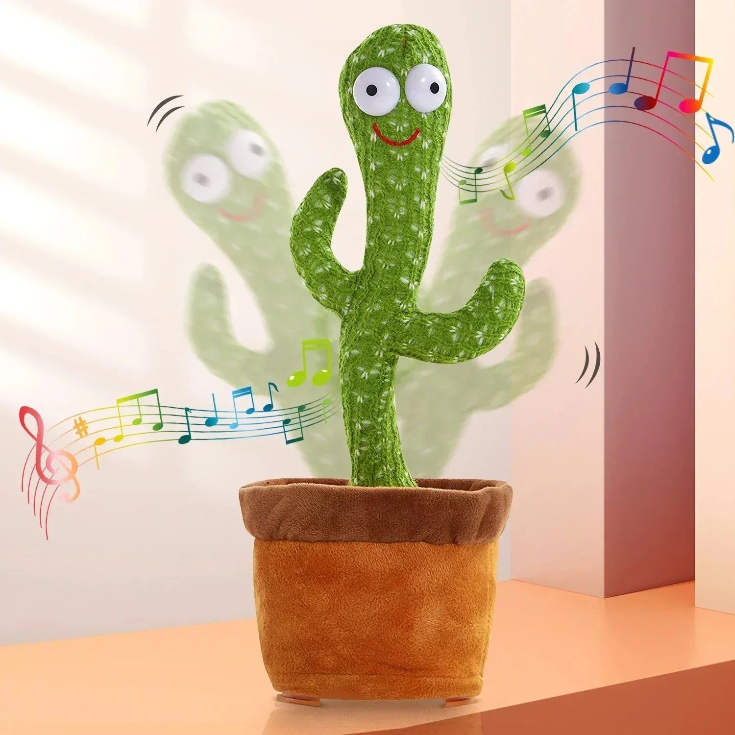Plush cactus toy with music notes on a plain background